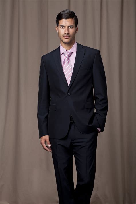 black suit with pink shirt.